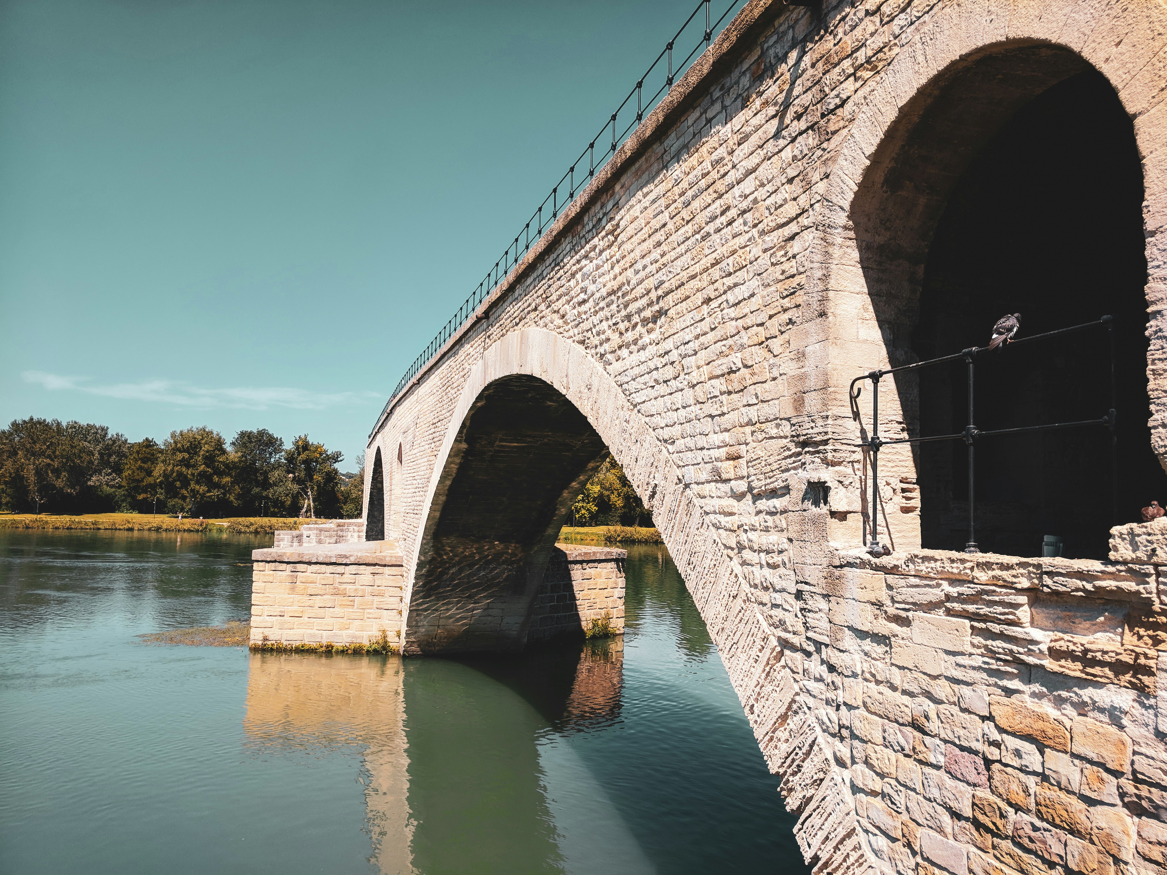 brown brick bridge over river